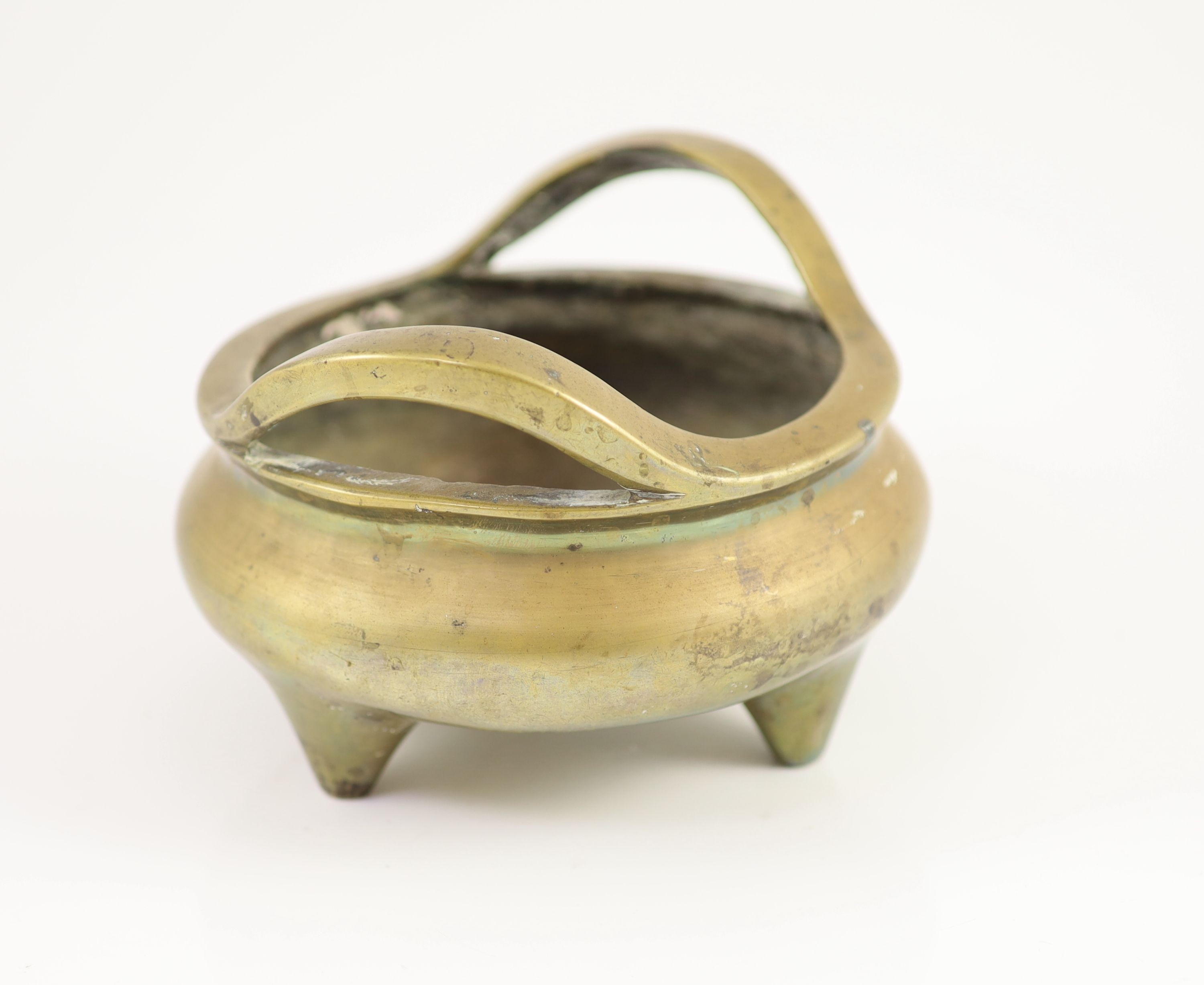 A large Chinese bronze tripod censer, ding, Xuande mark, Qing dynasty, 17cm wide